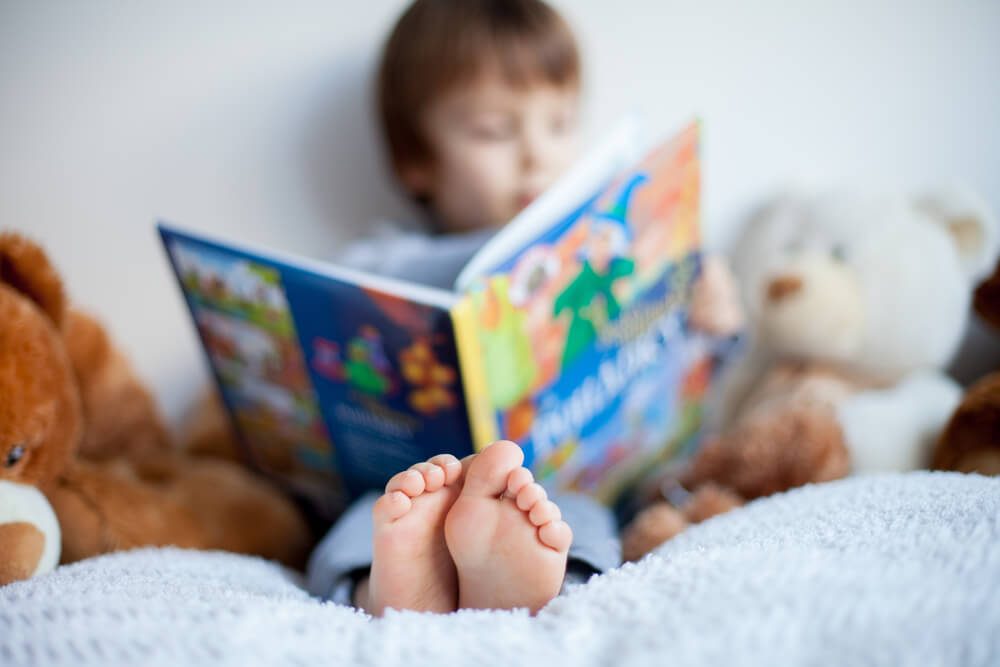 Boy, reading a book, educating