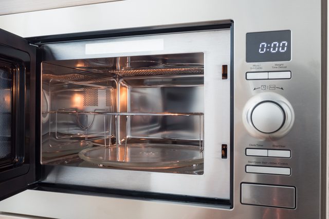 Microwave with timer clock in kitchen