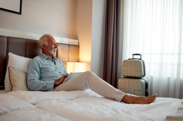 man in hotel room
