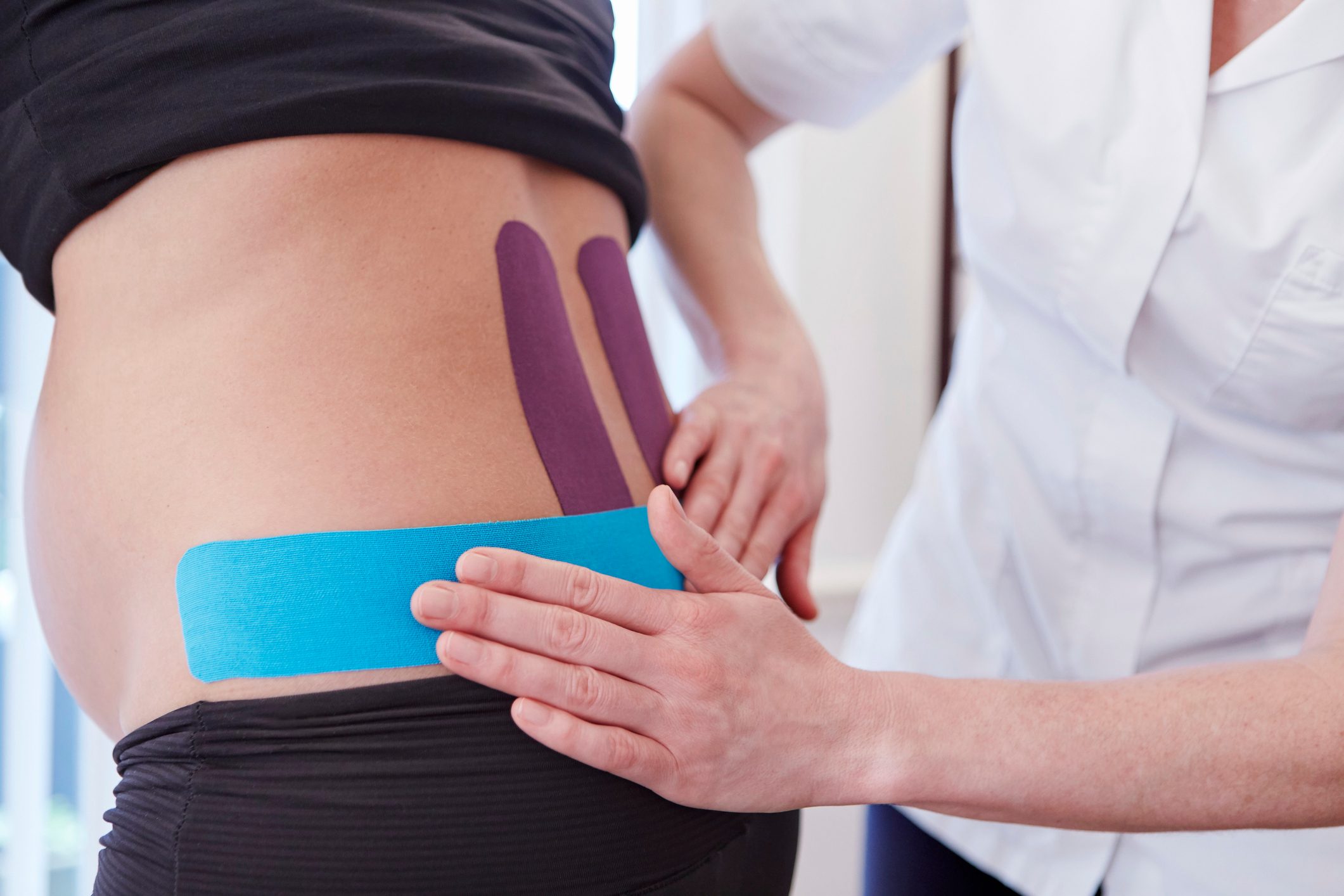 pregnant woman at chiropractor