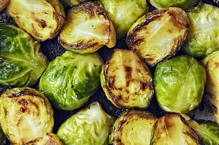 close up of rustic crispy fried brussels sprouts food background