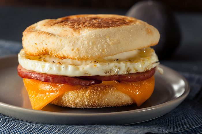 Homemade Breakfast Egg Sandwich with Cheese on an English Muffin