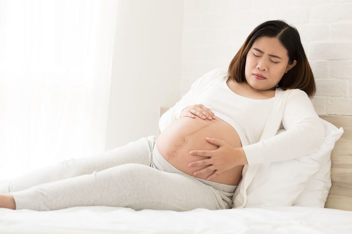 Hard belly and abdominal tightening during pregnancy at 36 weeks pregnant with constant hard stomach and feels like a sharp pain in abdomen.