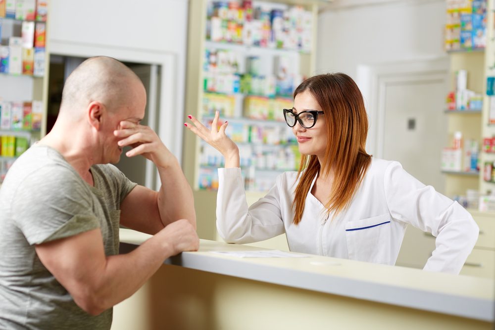 pharmacist talking to patient