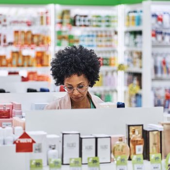 female customer shopping in drug store