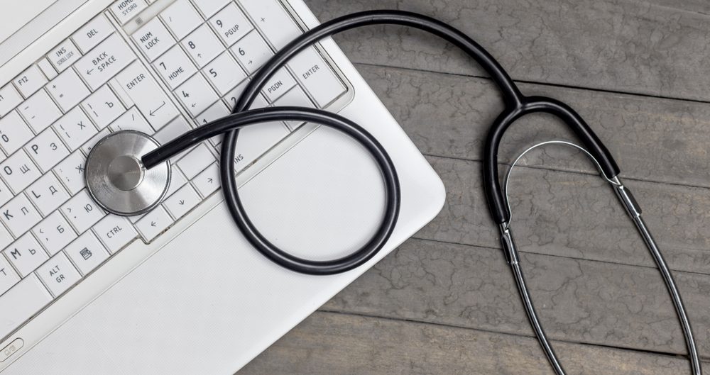 top view of stethoscope on laptop