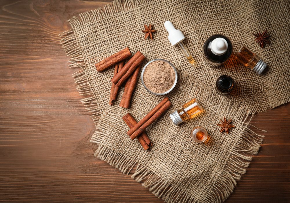 cinnamon sticks and bottles of cinnamon