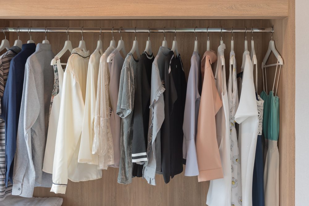clothes hanging in closet