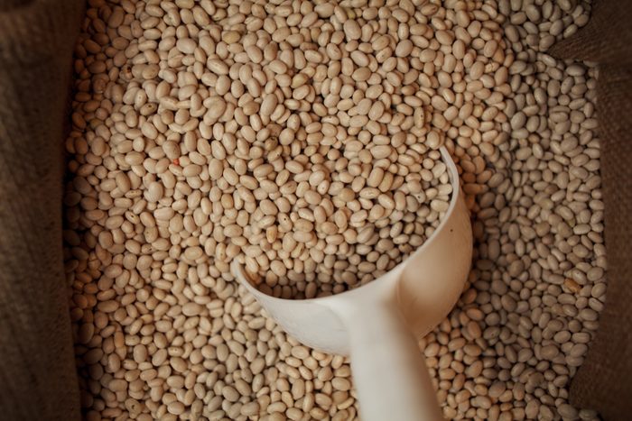 brown lentils with a scoop inside
