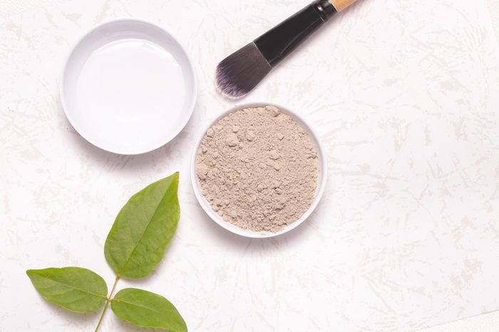 Clay powder and water on a white table