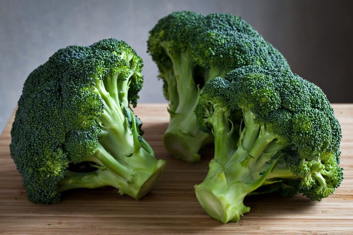 green broccoli on wooden board