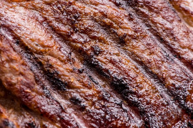 Big juicy grilled beef steak close up