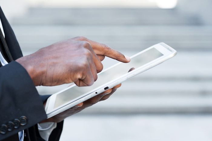 hand working on a electronic tablet