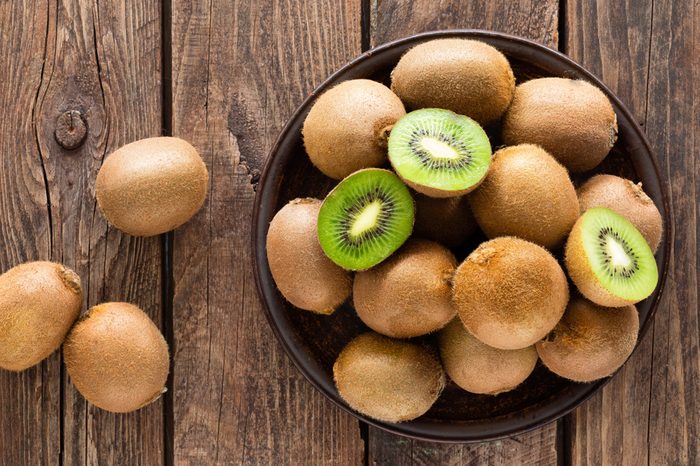 Kiwi fruit on wooden rustic table, ingredient for detox smoothie
