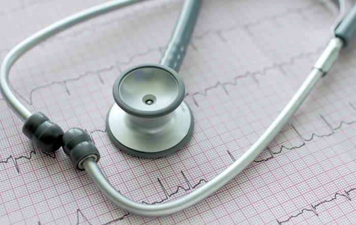 stethoscope on the ECG. Symbolic close-up photo