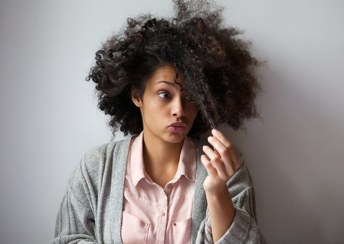 Close up portrait of a girl with thick curly hair