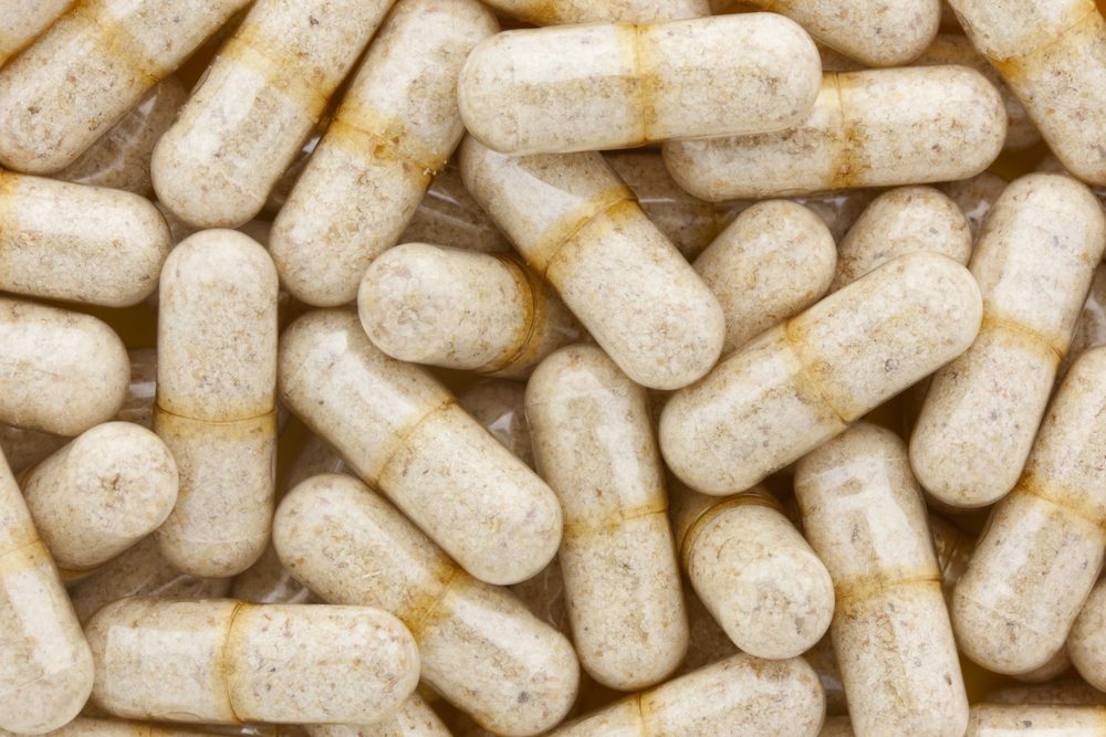 Ground psyllium in clear capsules is taken as a dietary fiber supplement. At certain dose levels this all natural supplement is taken as a cholesterol reducer.