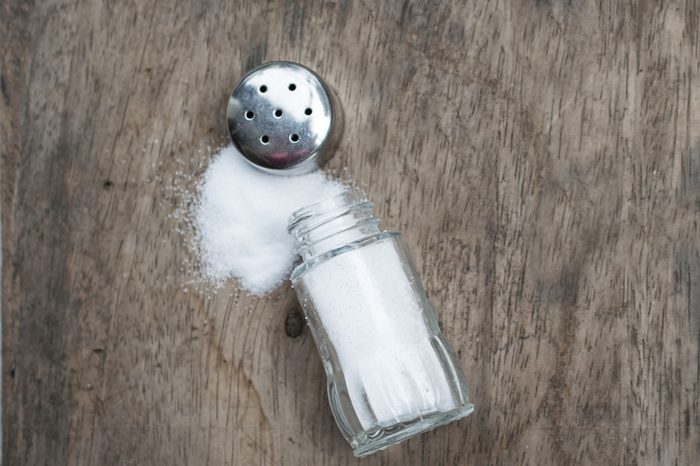 Salt Shaker on the old wooden table