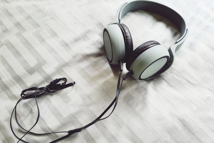 Top view of headphone on bed.