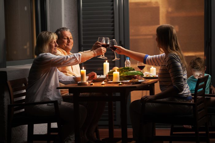 Quiet family dinner in the backyard