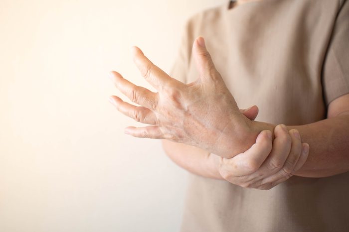 man with wrist hand bone pain