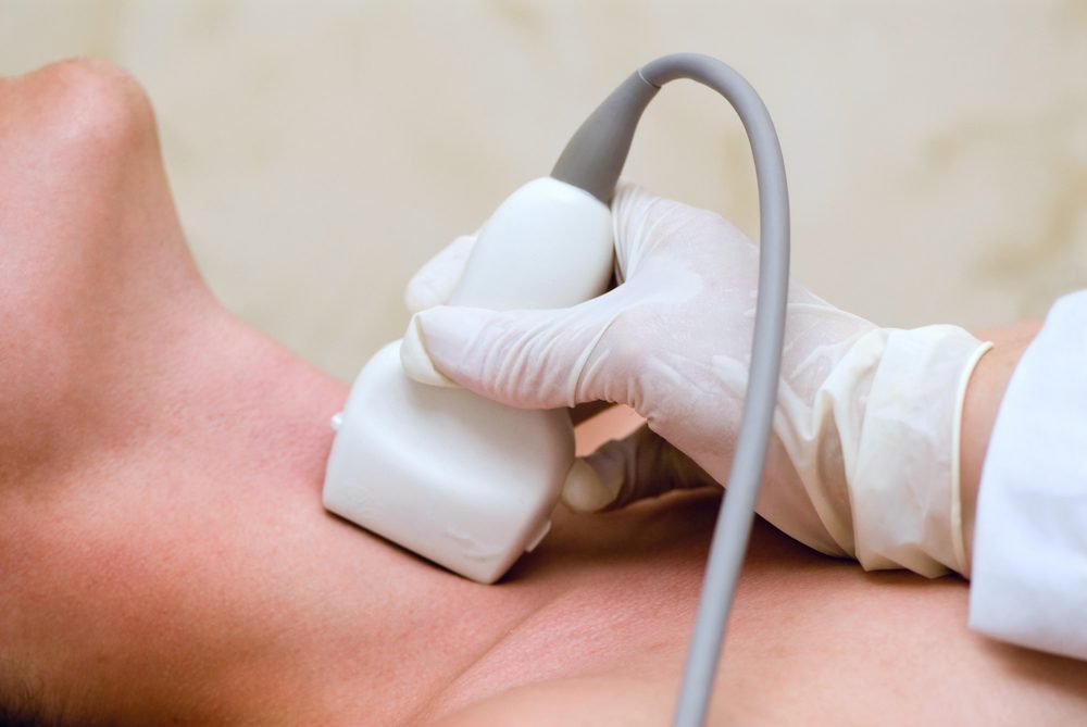 scanning of a thyroid of man