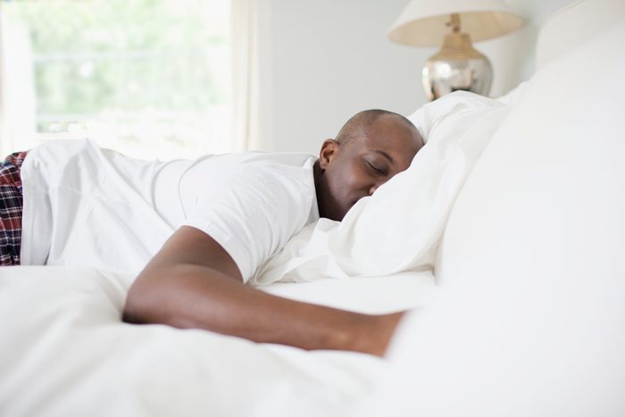man sleeping in on the weekend