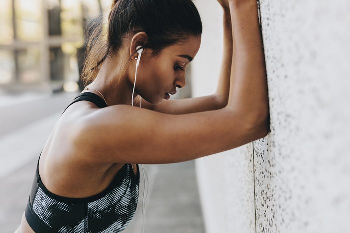woman working out tired