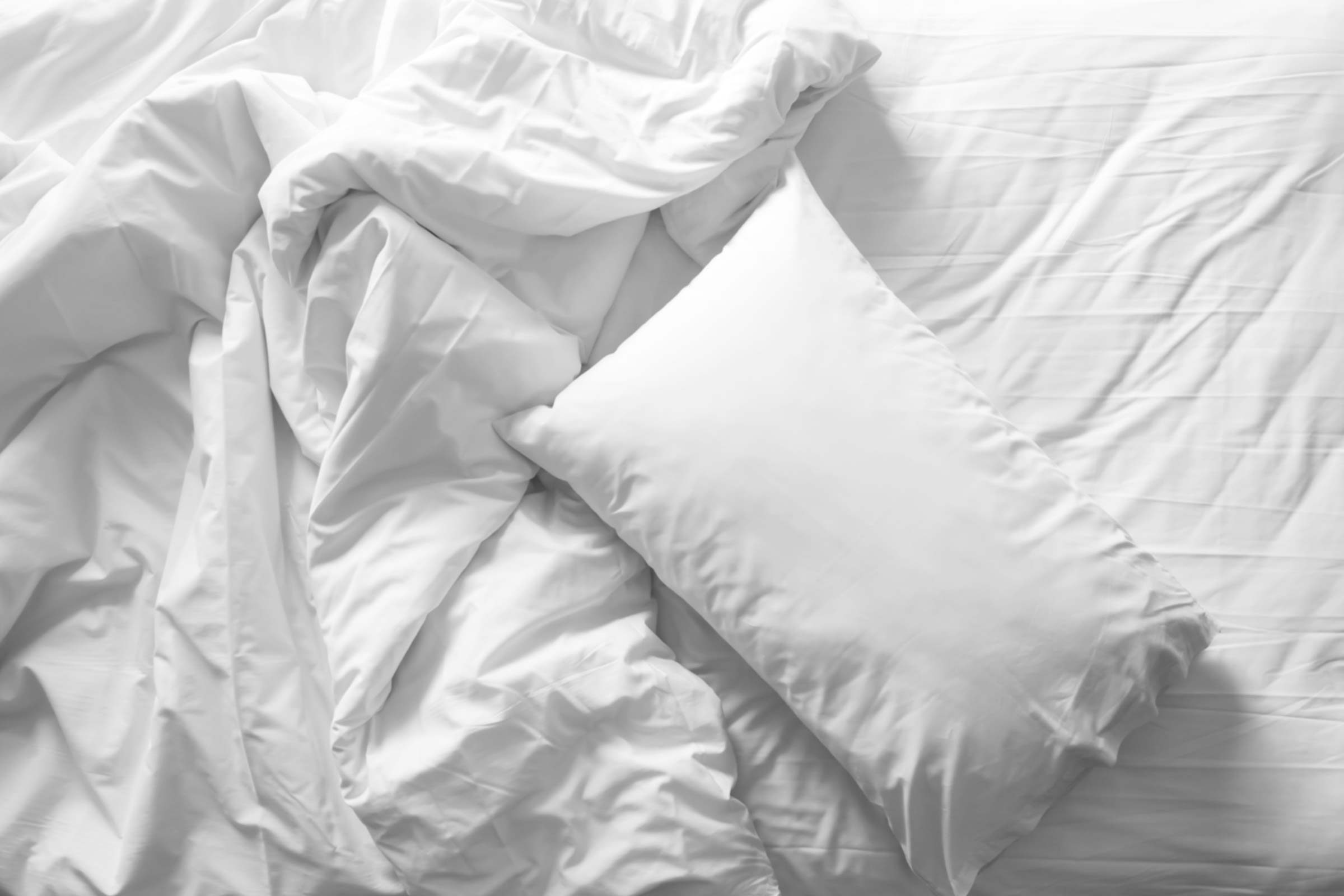 pillow bed sheets, unmade