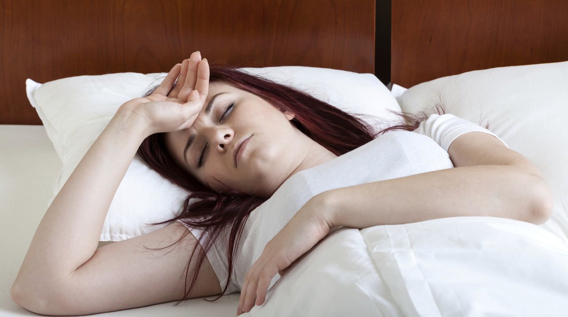 woman sick in bed
