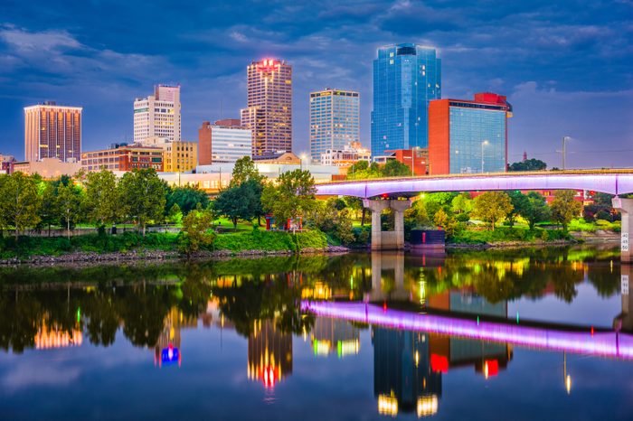 Little Rock, Arkansas, USA skyline on the river at twilight.