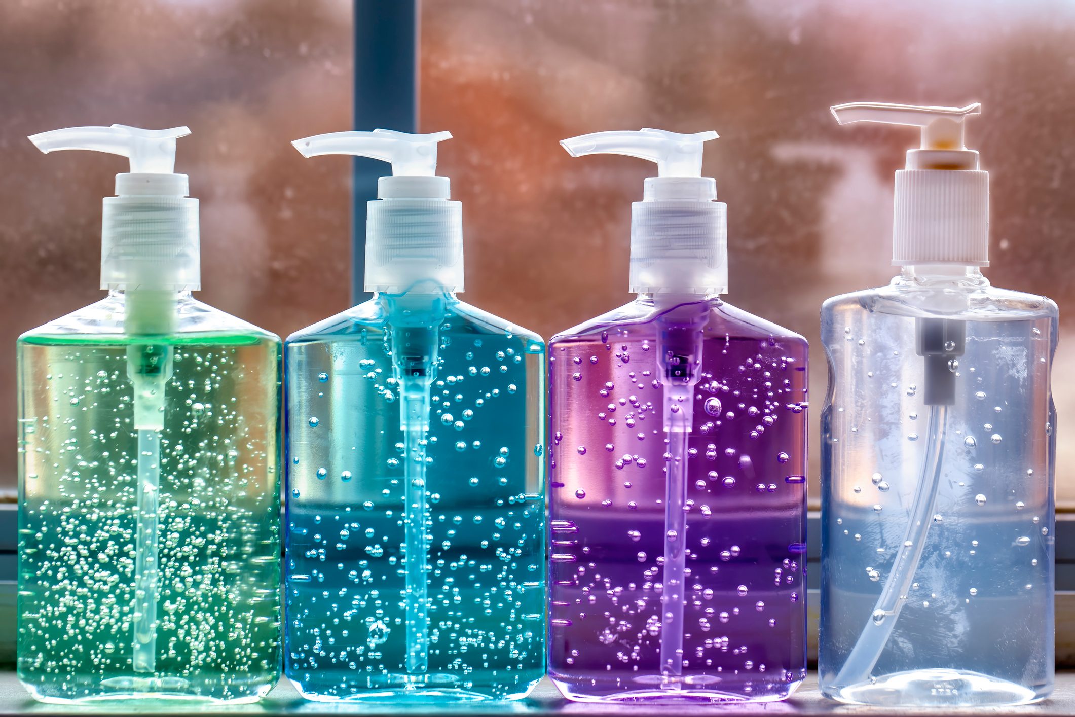 variety of hand sanitizers lined up