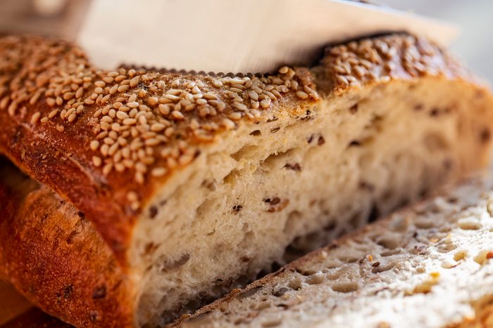 Close up of slicing bread