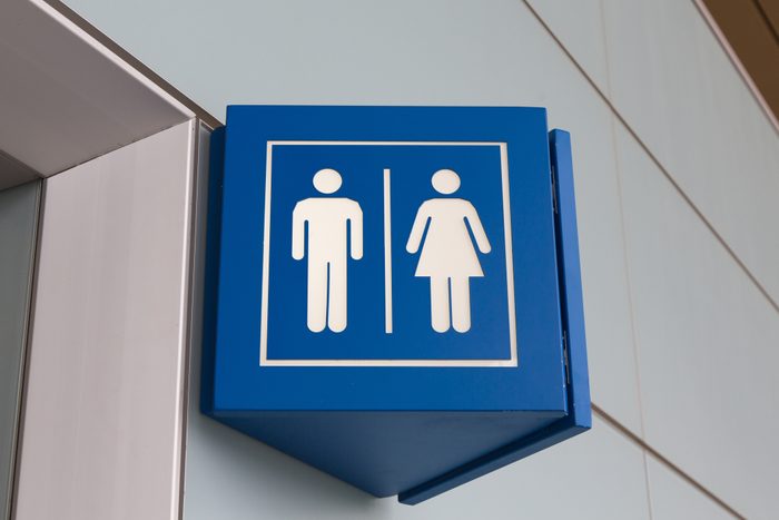 Low Angle View Of Restroom Sign