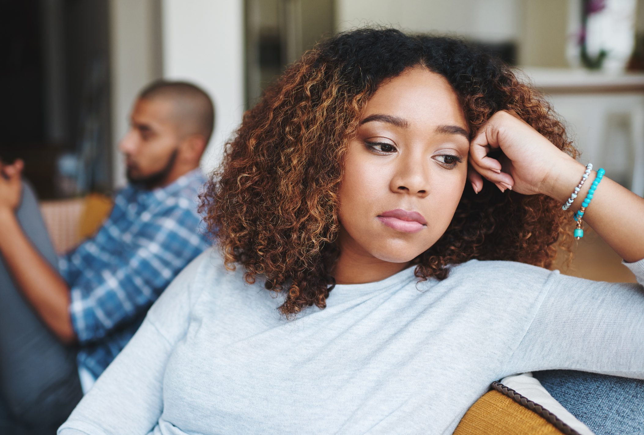 woman looking away from man, argument