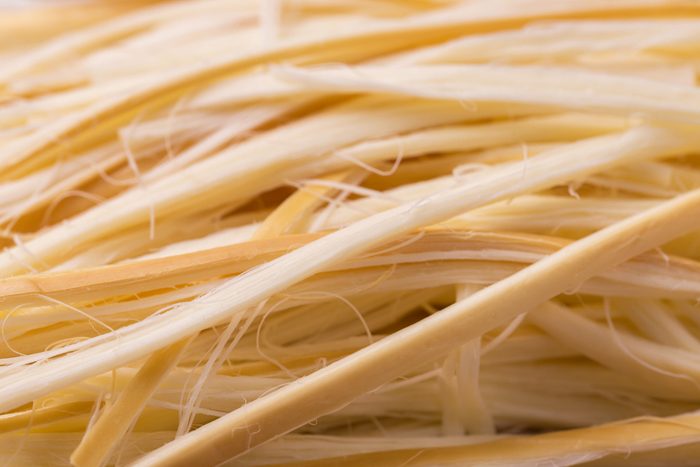 Healthy Snack. Smoked string cheese. Kobarcik. Selective focus