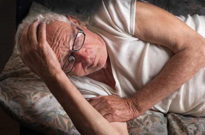 Senior man laying down
