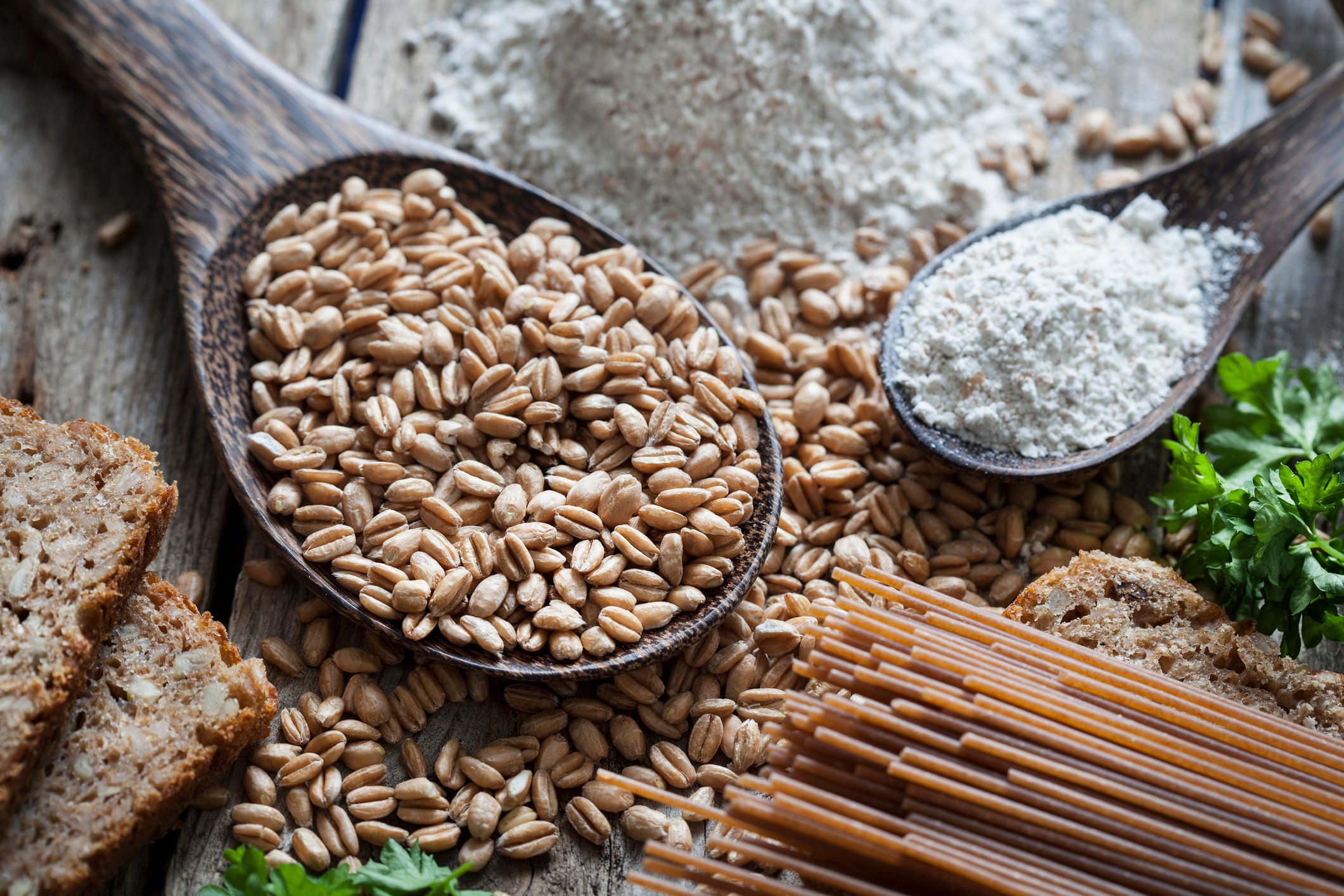 Raw spelt grain and flour, pasta, bread