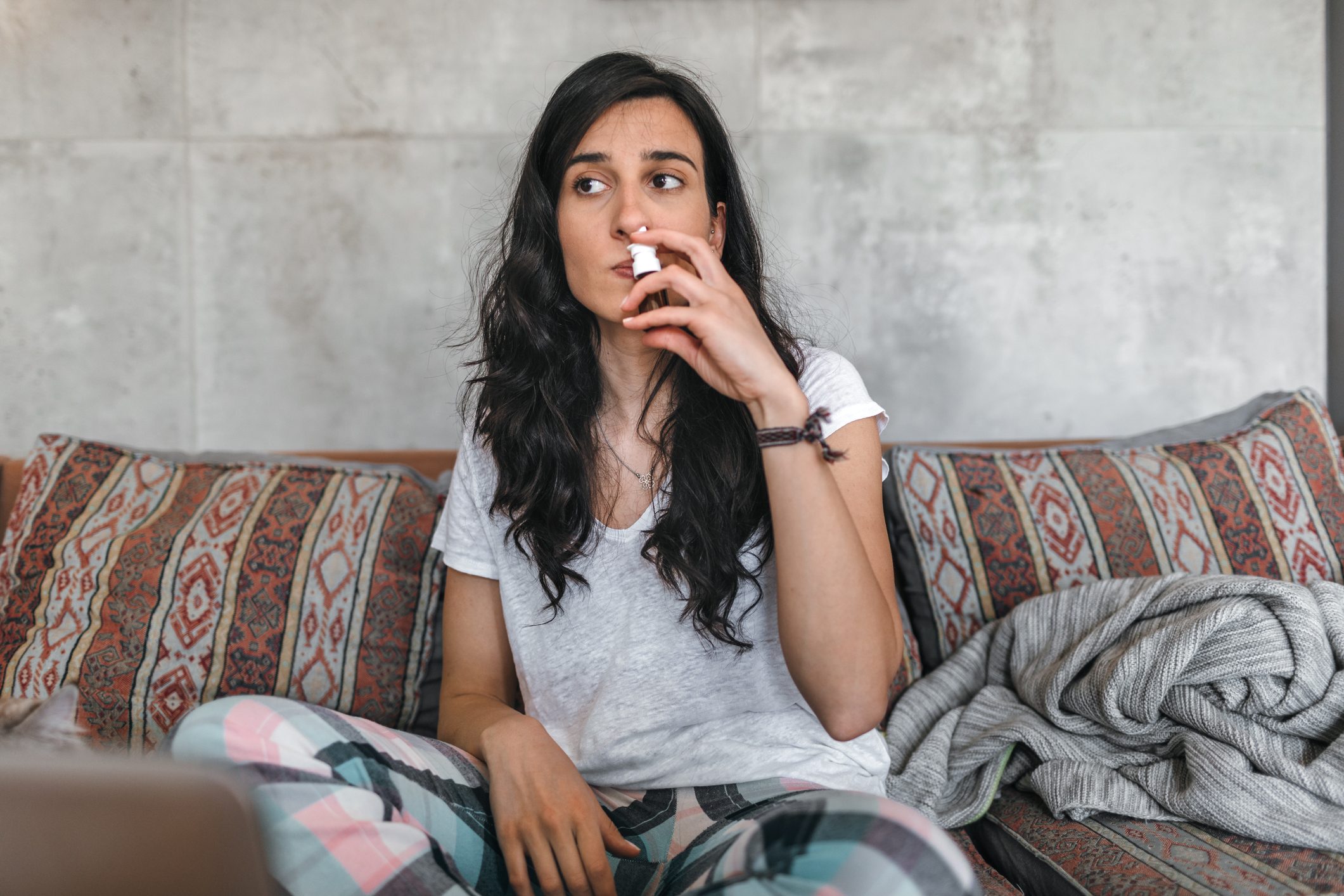 Young Woman Sick At Home