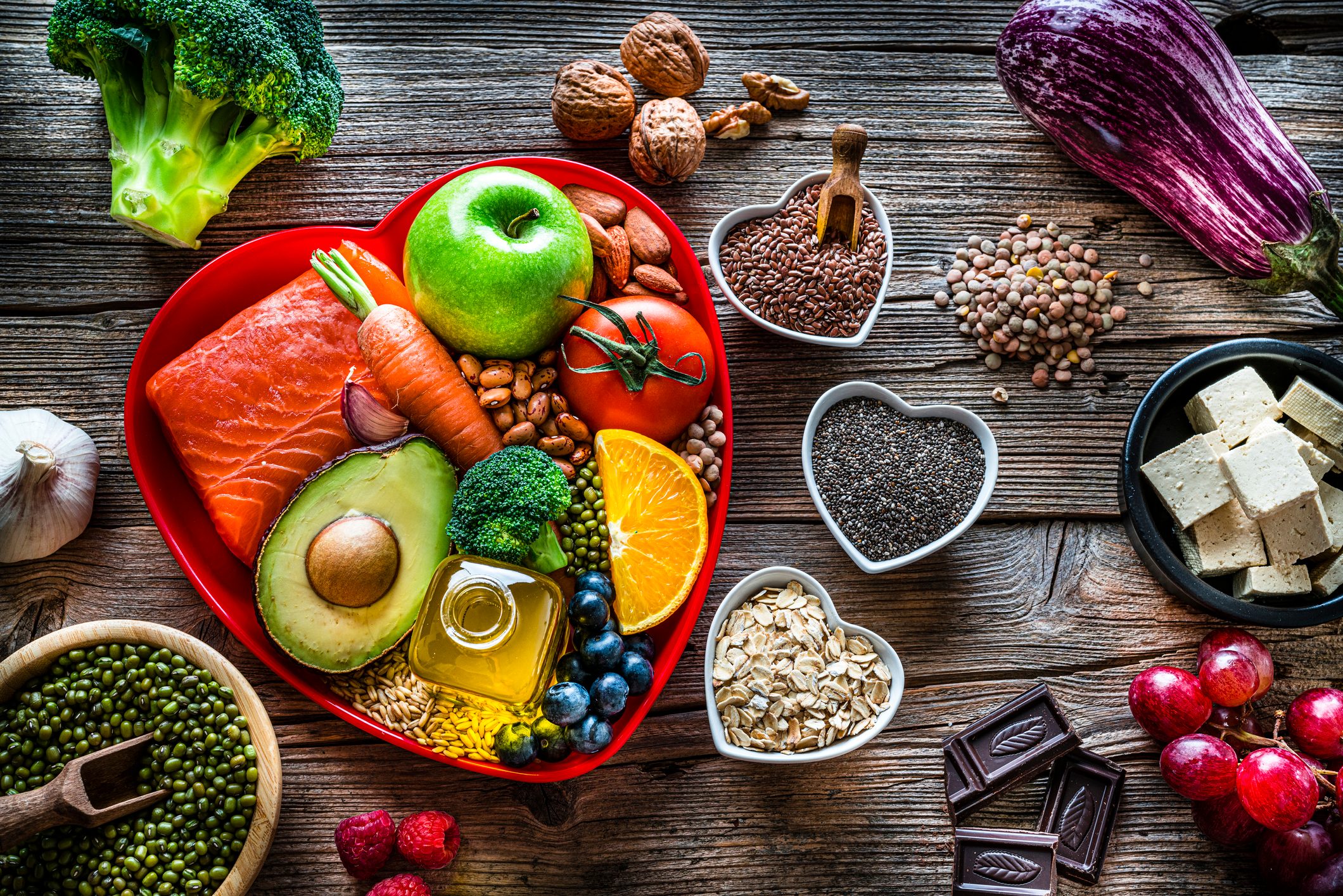 Healthy food for lower cholesterol and heart care shot on wooden table