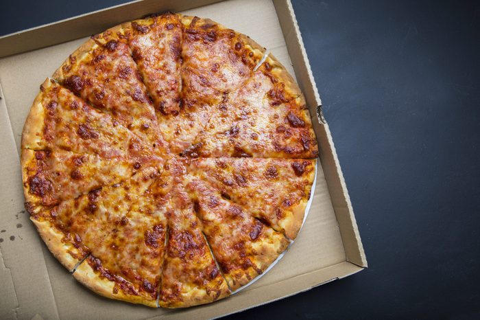 Delicious Cheese Pizza fresh from the oven in a box