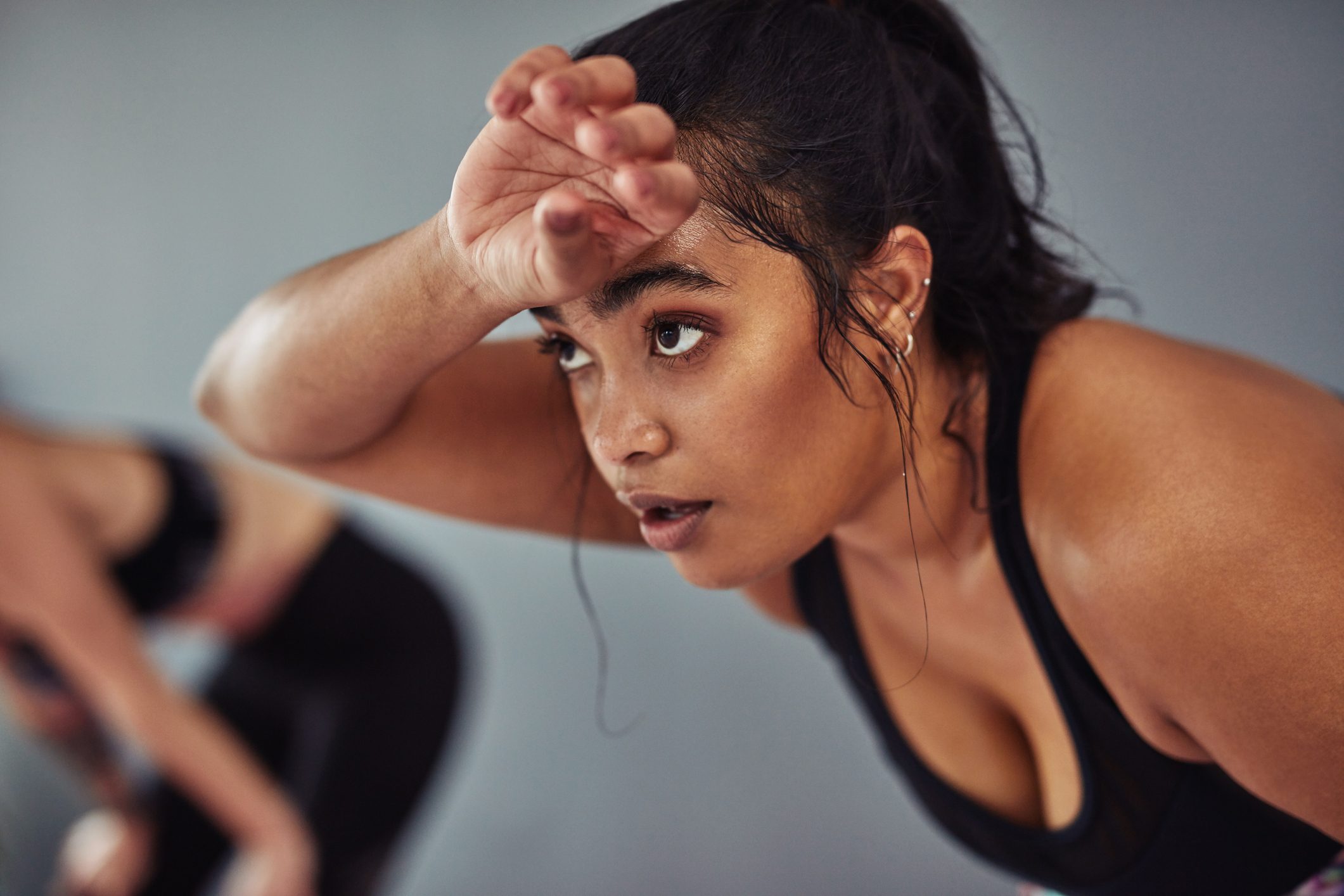 woman taking a break from an intense workout