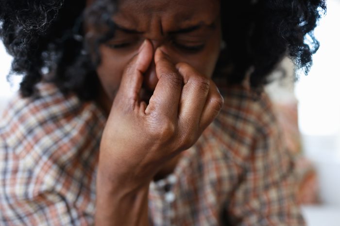 Woman Suffers From Sinus Headache