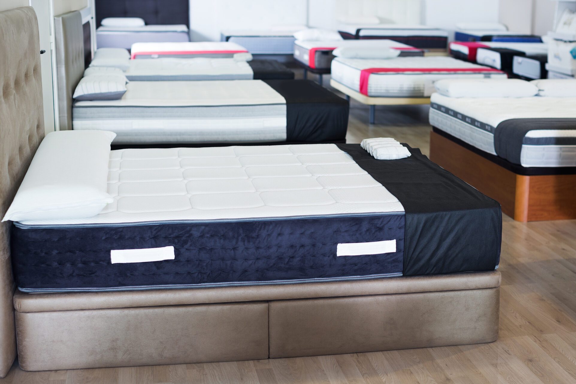 new mattresses on the beds in the store