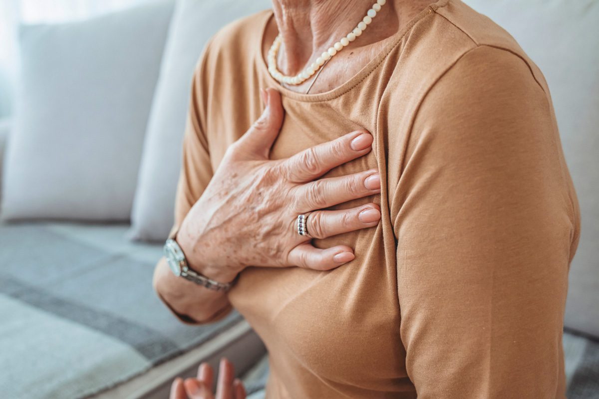old woman having a heart attack
