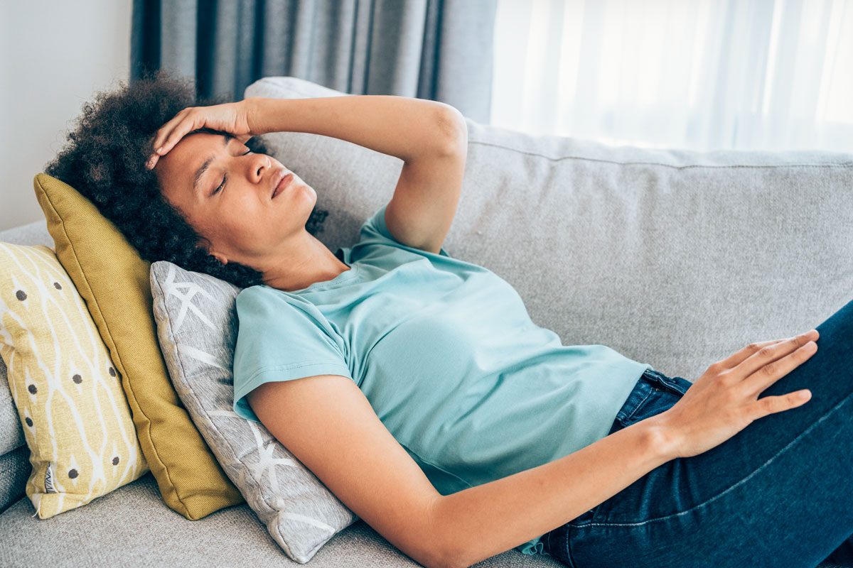 Woman With High Fever And Headache